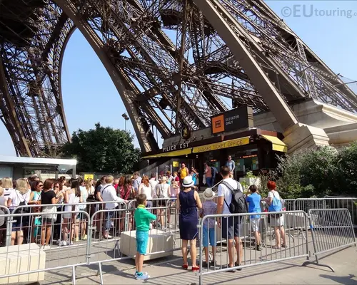 Visitors entering the Eiffel Tower in Paris
